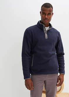 Camiseta polar tipo troyer con prácticos bolsillos y bonitos detalles en contraste