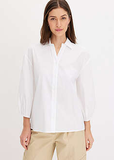 Blusa asimétrica con mangas abullonadas