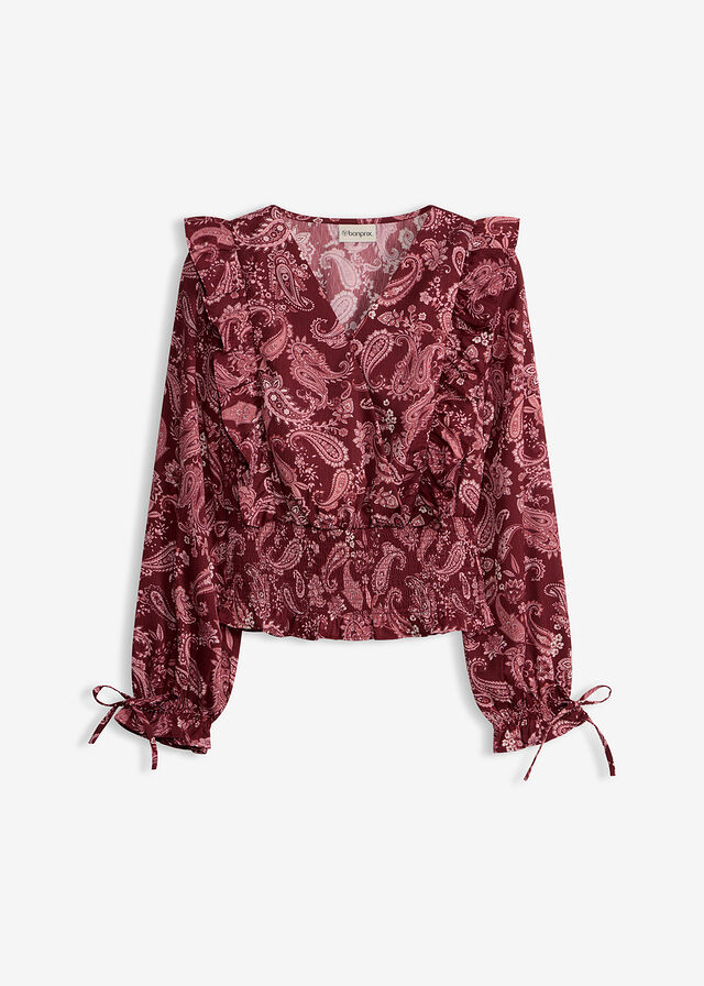Blusa con volantes y nido de abeja